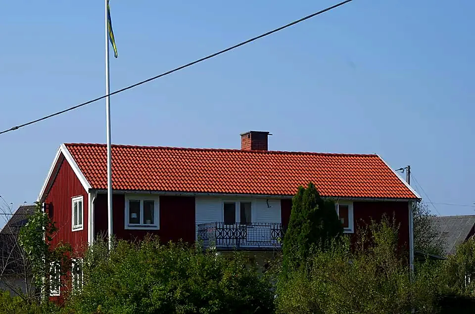 Nymålat tegeltak efter takmålning